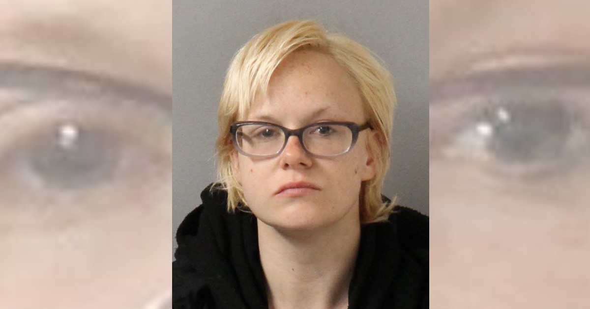 Police find woman on bathroom floor; empty cans of air duster beside her