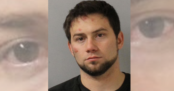 Drunk man jumps from roof of Nashville gay bar, goes on rampage against parked cars