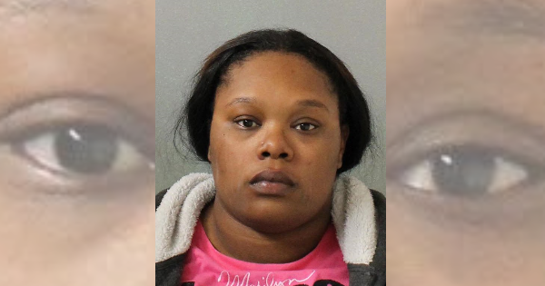 Woman charged for hitting cousin with her car during an argument over a parking spot
