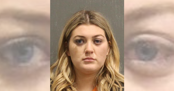 Woman punches boyfriend at Tin Roof, found with hydrocodone while being booked